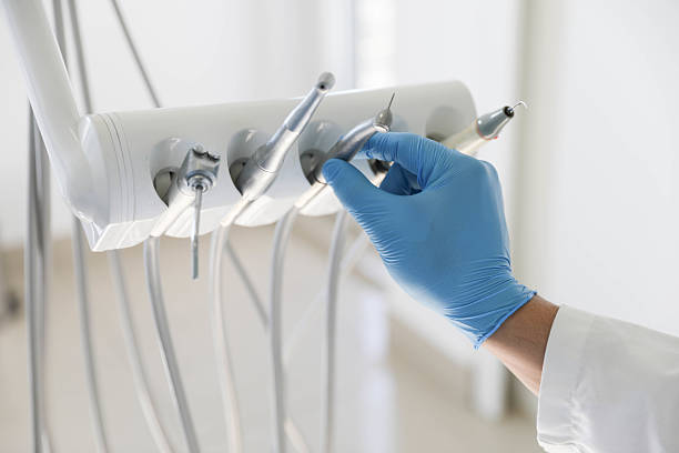 Professional Tooth Extraction technician working in Princeville, NC
